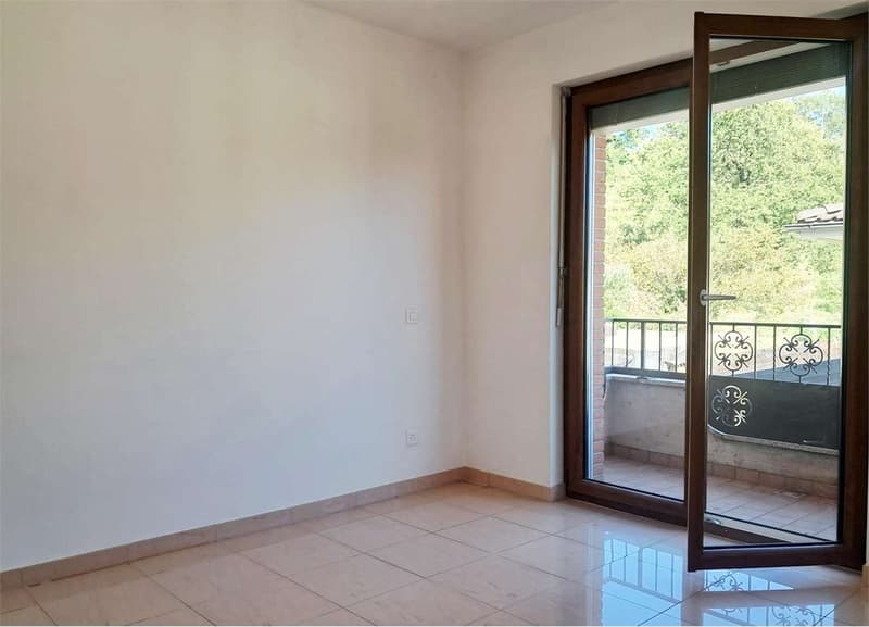 Spazioso attico di 4,5 locali con vista lago in casa bifamiliare (6)
