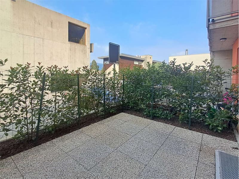 Melano: piacevole maisonette di 3,5 locali con terrazze e parcheggi (3)