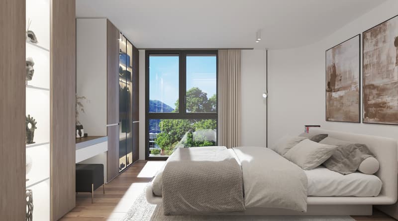 Spacious bedroom with large windows offering a scenic view, wooden flooring, built-in wardrobes, and neutral-toned decor with artwork on the walls.