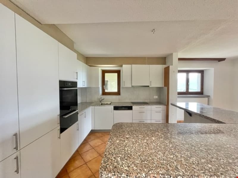 modern kitchen, white cabinets, granite countertops, built-in oven and microwave, sink with faucet, dishwasher, tiled floor