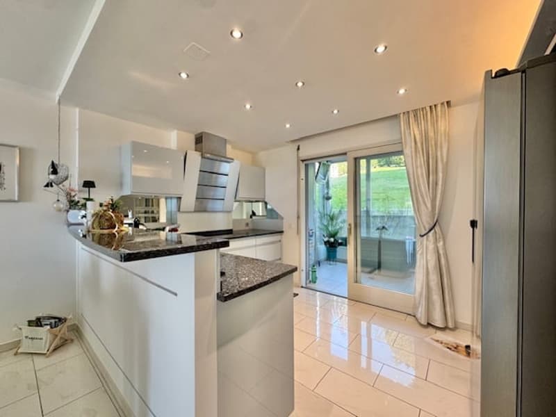 For sale in Minusio - Spacious 4.5-room apartment on the ground floor with lake view (Secondary residence) (7)
