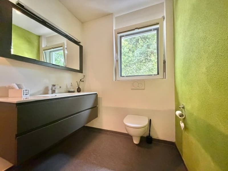 Moderne Einfamilienhaus mit privatem Garten in Golino zu verkaufen (14)