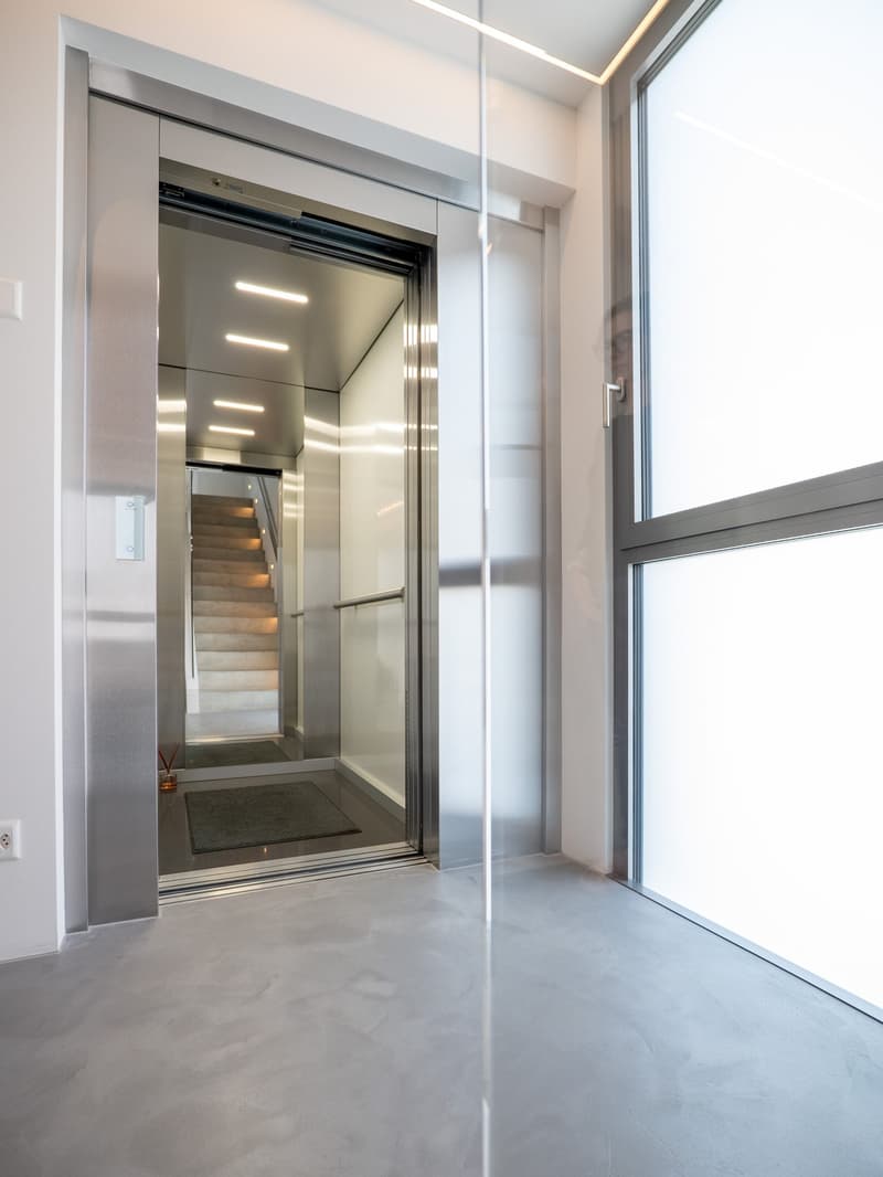 VENDESI A MINUSIO - moderno attico duplex di 4.5 locali con vista lago in casa bifamiliare (24)