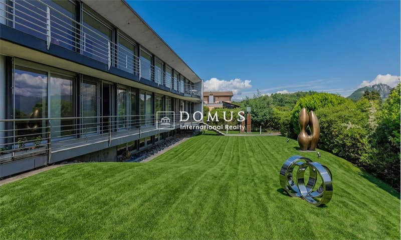 Moderna villa con vista lago a Carona (1)