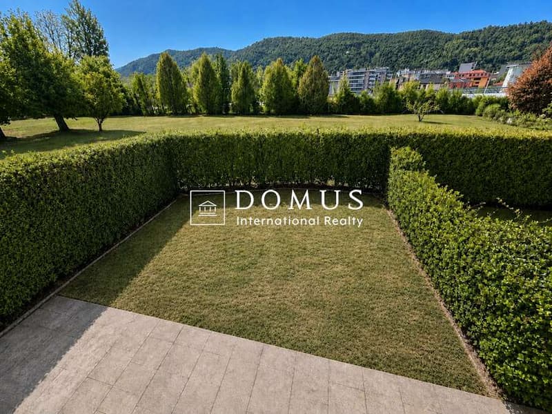 Casa a schiera con giardino privato e due posti auto (5)