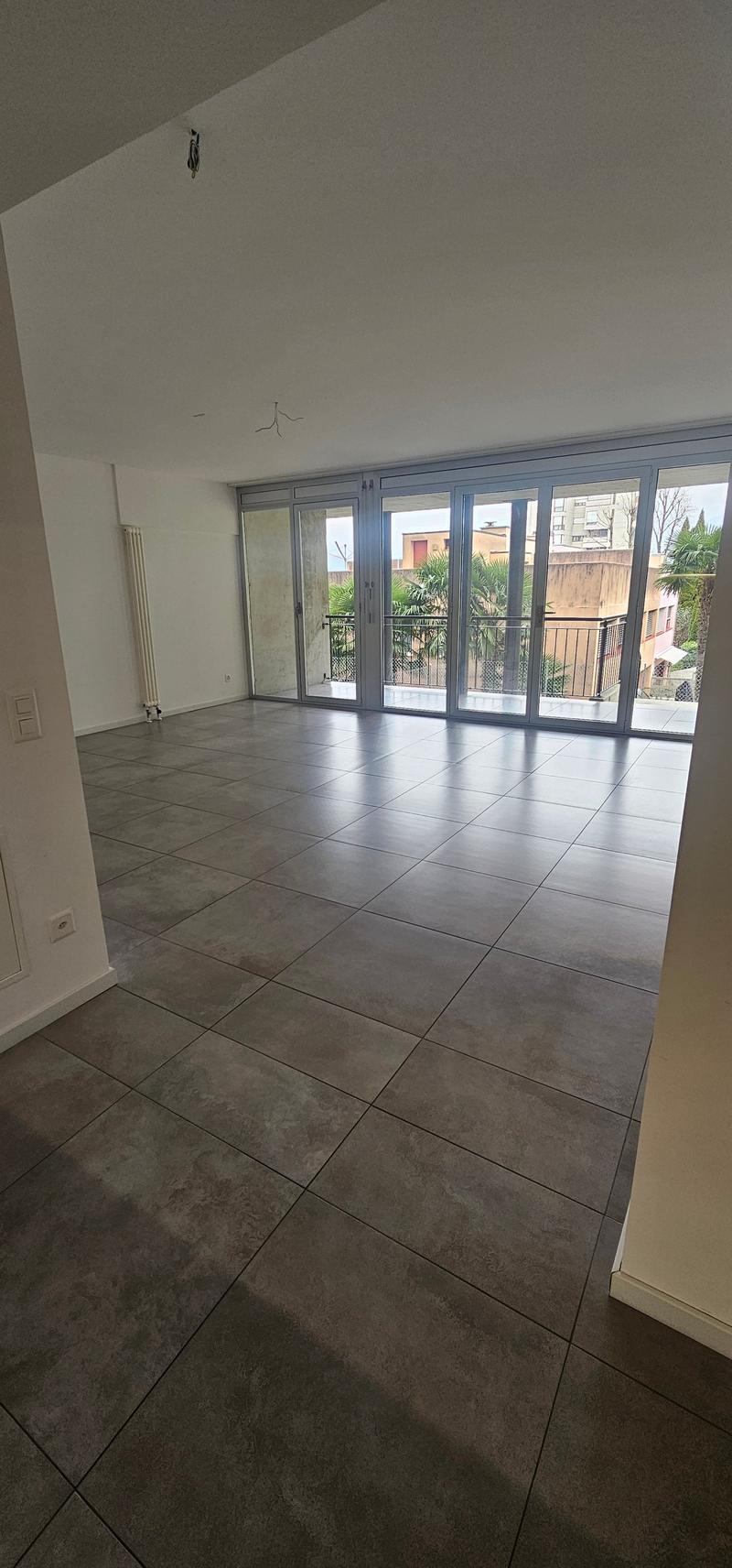 tiled floor, sliding glass doors, balcony