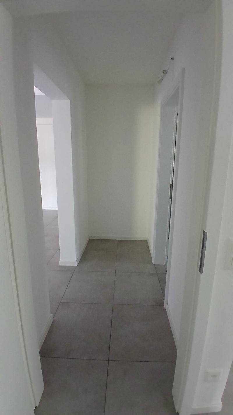 Modern 2.5-room apartment with terrace and private garden in Pazzallo (7)