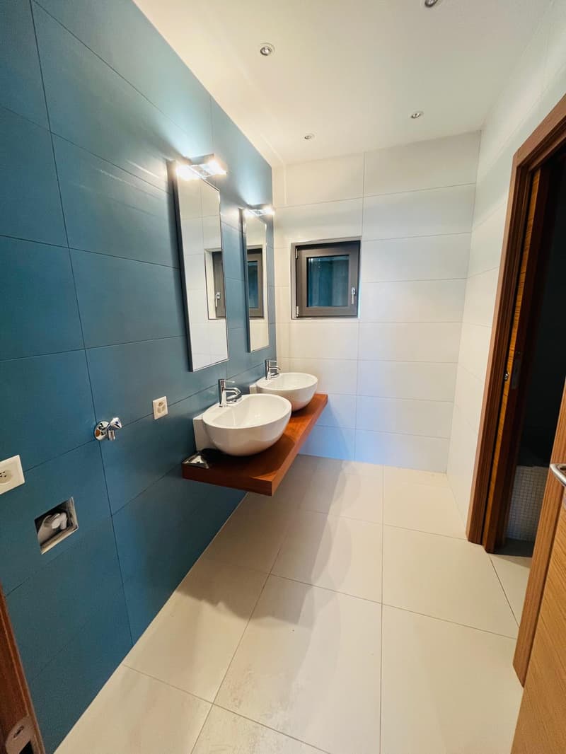 Appartamento di 3.5 locali con giardino e vista lago (9)
