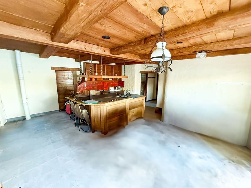 kitchen room with wooden ceiling, tiled floor, central island counter, hanging lamps, open shelves, table, chairs