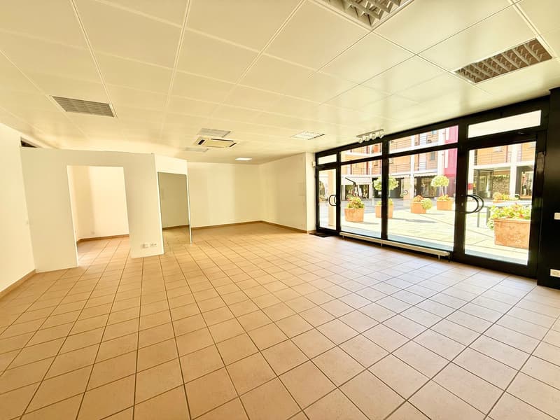 empty room, square tiles, double doors, windows, hallway