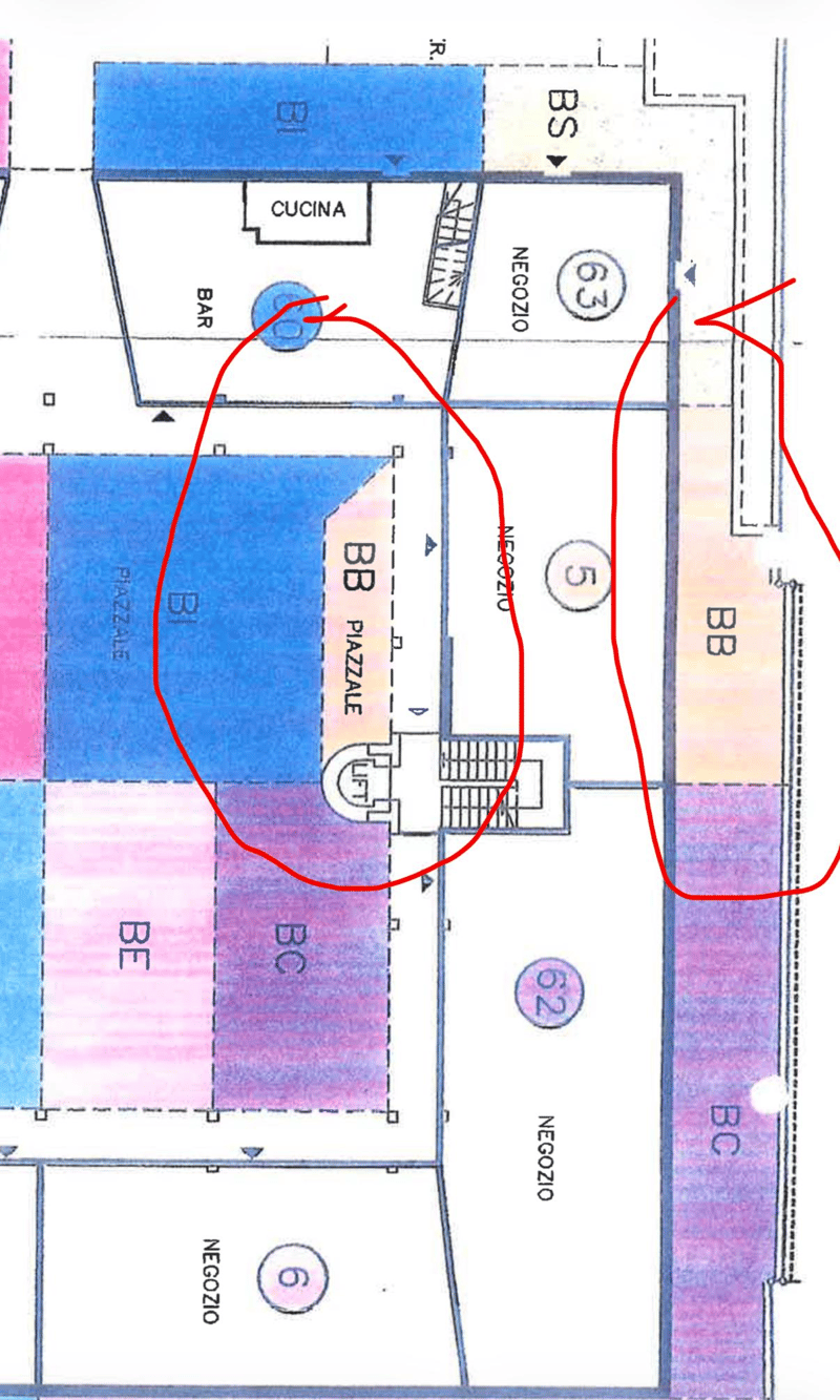 Floor plan with labeled sections, including a kitchen, bar, and storage areas.