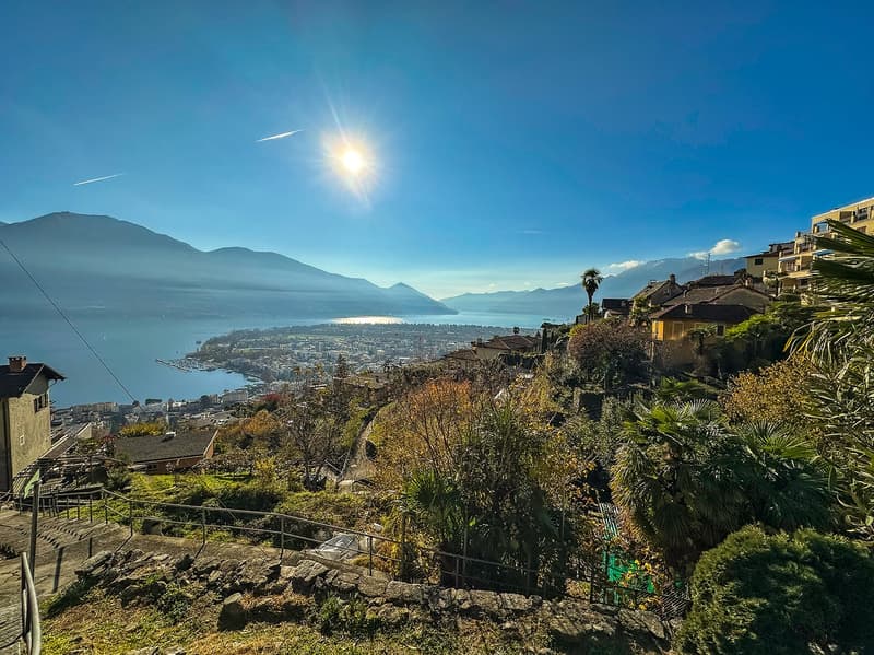 hillside view, houses, mountains, lake, clear sky, sun