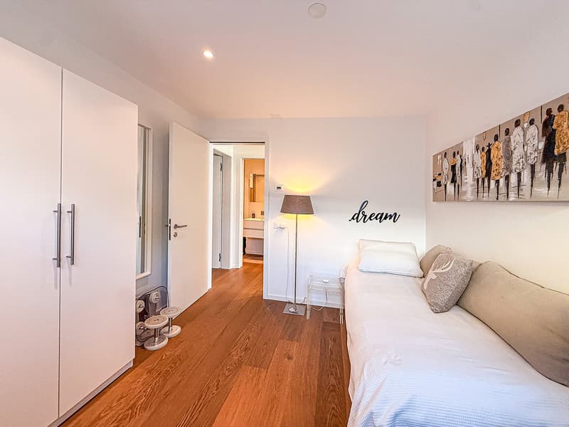 Appartamento 3.5 locali con giardino e vista panoramica sul lago (23)