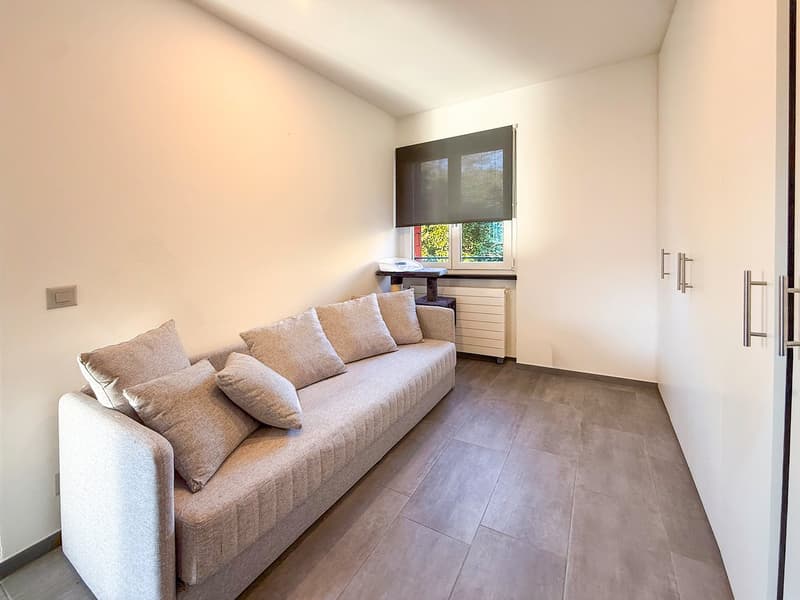 Splendida casa plurifamiliare di 10 locali a Solduno (26)