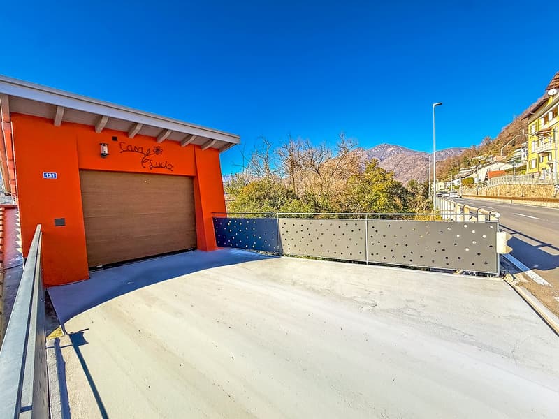 Splendida casa plurifamiliare di 10 locali a Solduno (28)