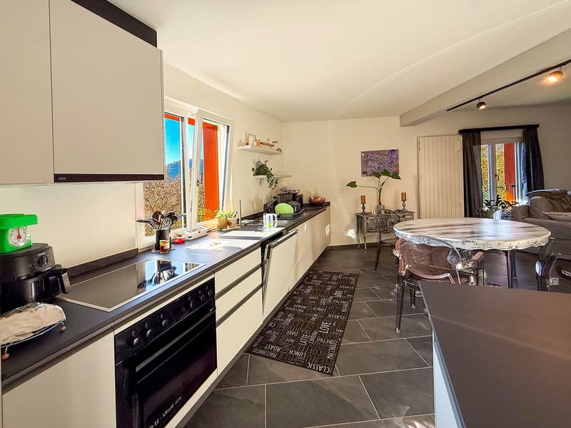 Splendida casa plurifamiliare di 10 locali a Solduno (32)