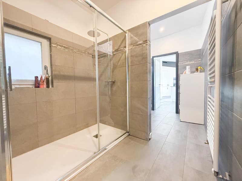 Splendida casa plurifamiliare di 10 locali a Solduno (24)