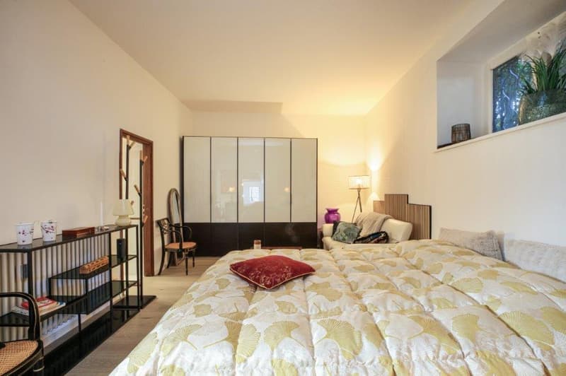 Large bed, chair, table, wardrobe, sofa, lamp, shelf