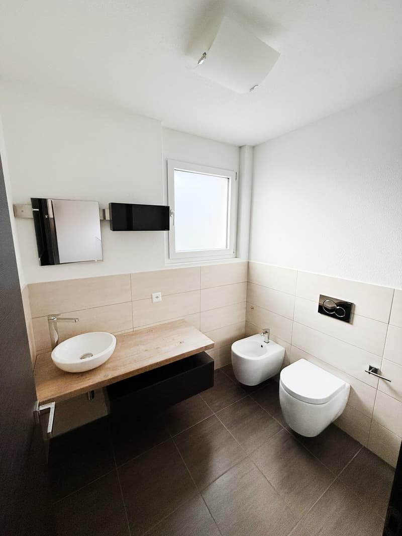 Maison moderne raffinée 4,5 avec jardin soigné, cheminée et taverne (7)