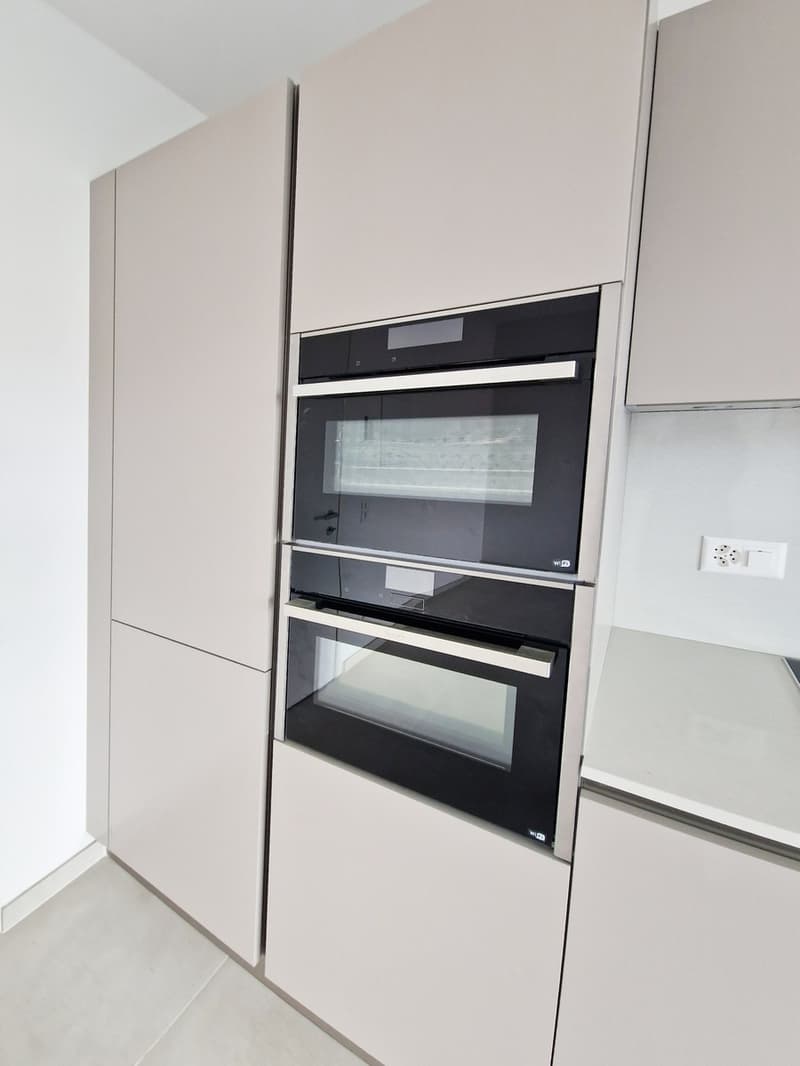 New modern 3.5-room apartment with two covered parking spaces, ready for immediate occupancy. (3)