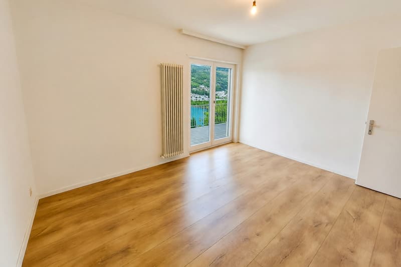 Zweifamilienhaus mit 7 Zimmern und Seeblick, Terrasse und Garten (11)