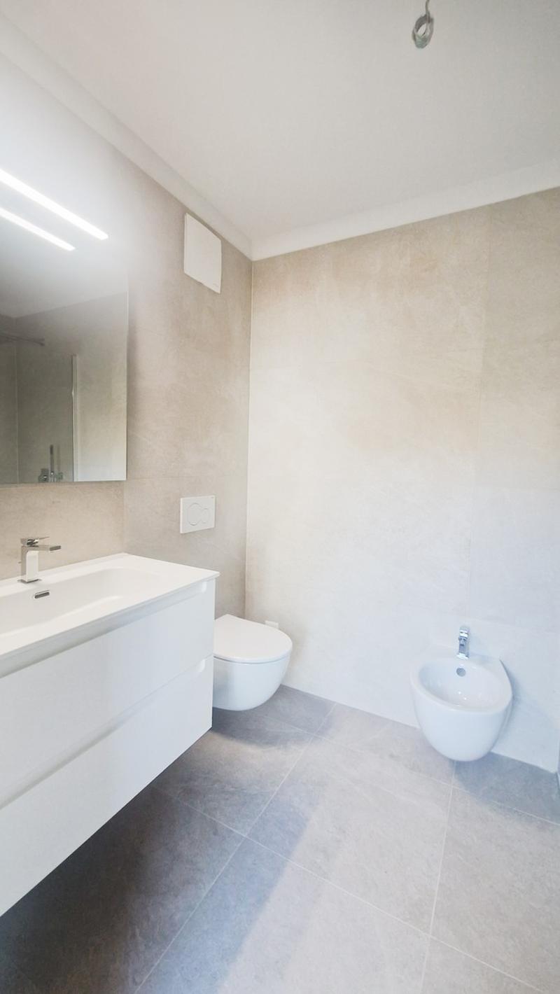 Maison 4,5 pièces dans une maison bifamiliale avec jardin privé. (12)