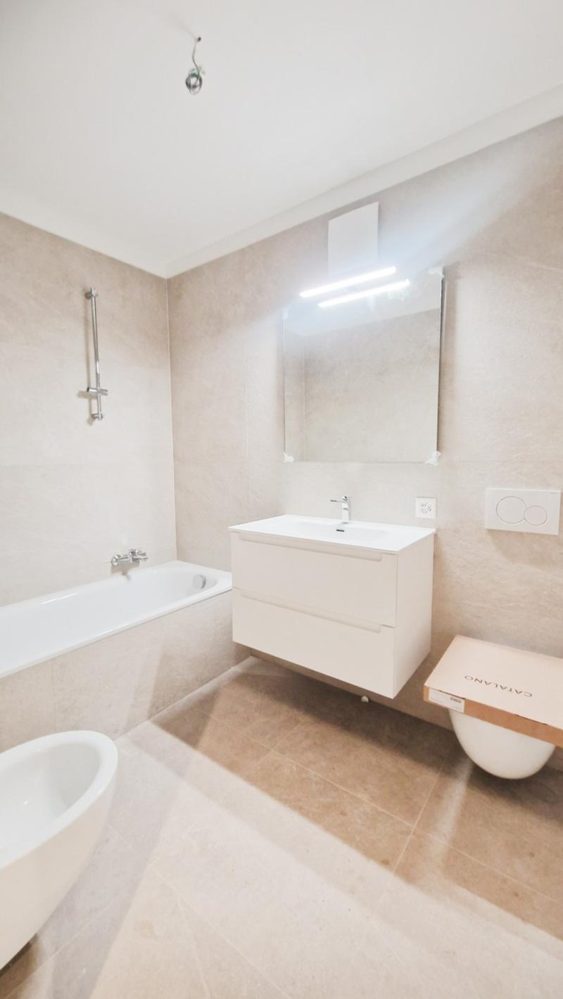 Maison 4,5 pièces dans une maison bifamiliale avec jardin privé. (11)
