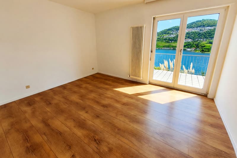 Maison bifamiliale de 7 pièces avec vue sur le lac, terrasse et jardin (9)