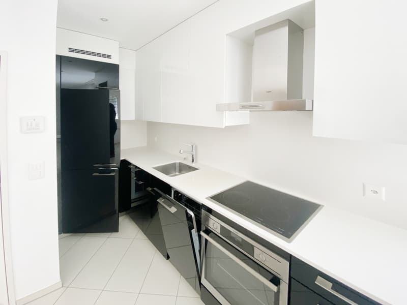 Modernes 2.5-Zimmer-Wohnung mit Terrasse und Parkplatz im Zentrum. (2)