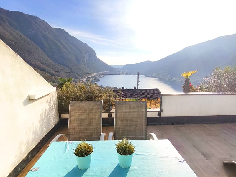 Appartement lumineux 2,5 pièces avec grande terrasse et vue sur le lac dans une résidence avec piscine (1)