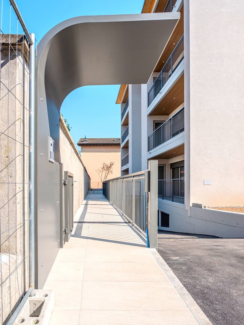 Appartement tout neuf de 2,5 pièces avec jardin privé et portique (12)