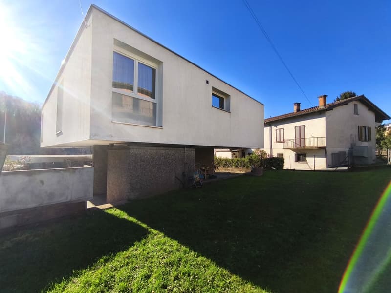Einfamilienhaus 5,5 mit Garten und Gewerbeflächen (1)