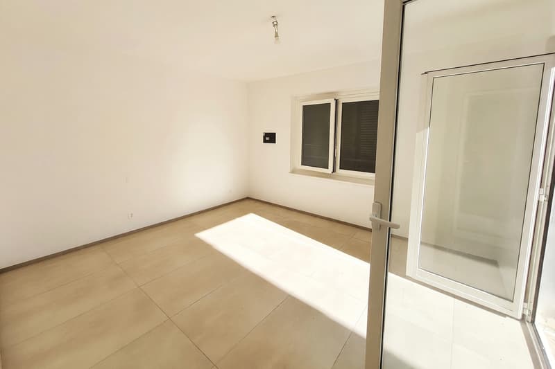 Appartement 3,5 en location, rénové avec jardin et mansarde (8)