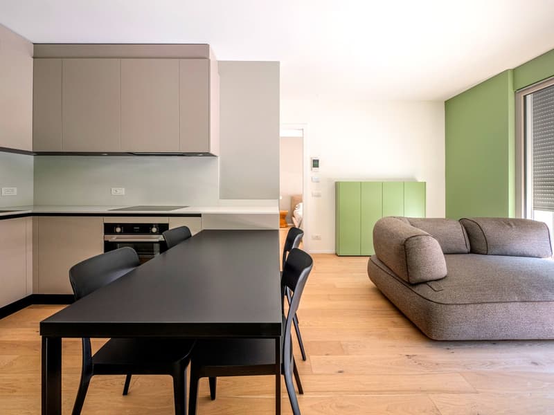 Nuovissimo appartamento 2.5 locali con giardino privato e portico (2)