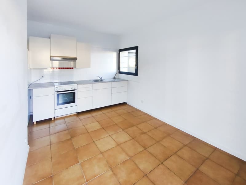 Interessante bifamiliare di due 3,5 con giardino vicino al centro (12)