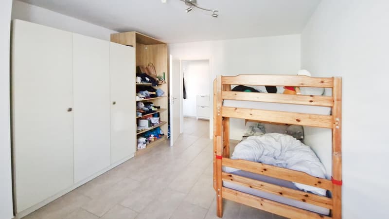 Elegante ampio 3,5 con balcone coperto e posteggio in autorimessa (6)