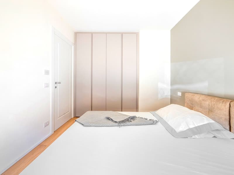 Nuovissimo appartamento 2.5 locali con giardino privato e portico (8)