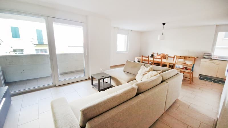 Elegante ampio 3,5 con balcone coperto e posteggio in autorimessa (3)