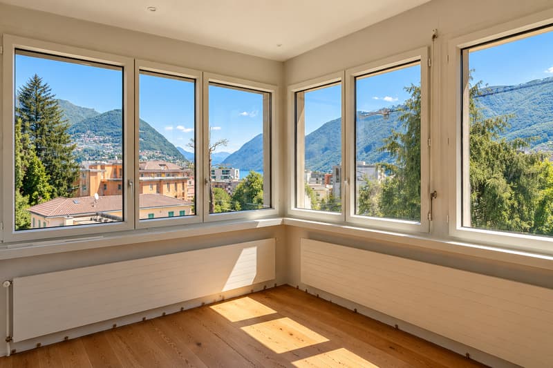 Prestigioso 5,5 ristrutturato in alto standing con terrazzo vista lago (1)