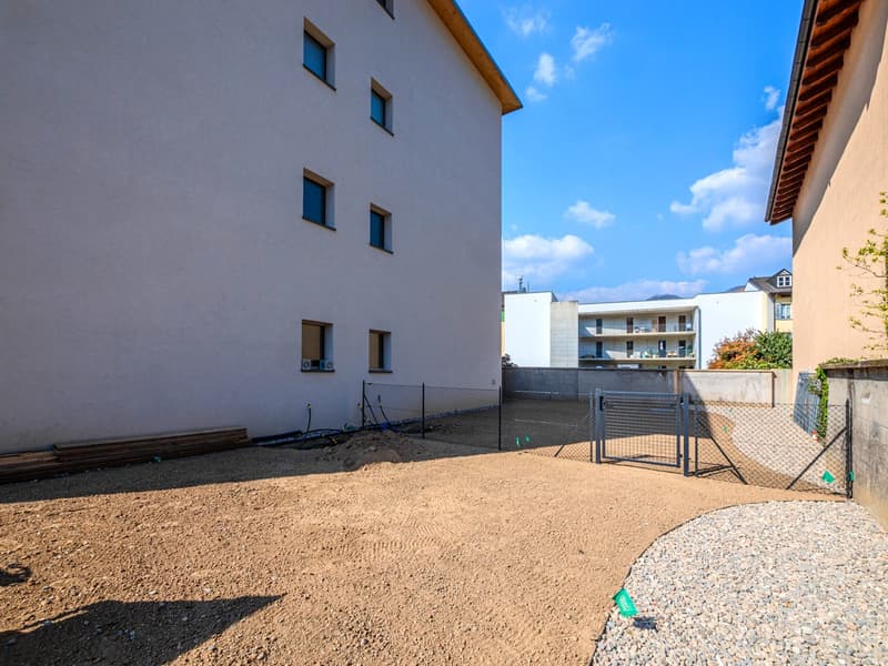 Nuovissimo appartamento 2.5 locali con giardino privato e portico (14)