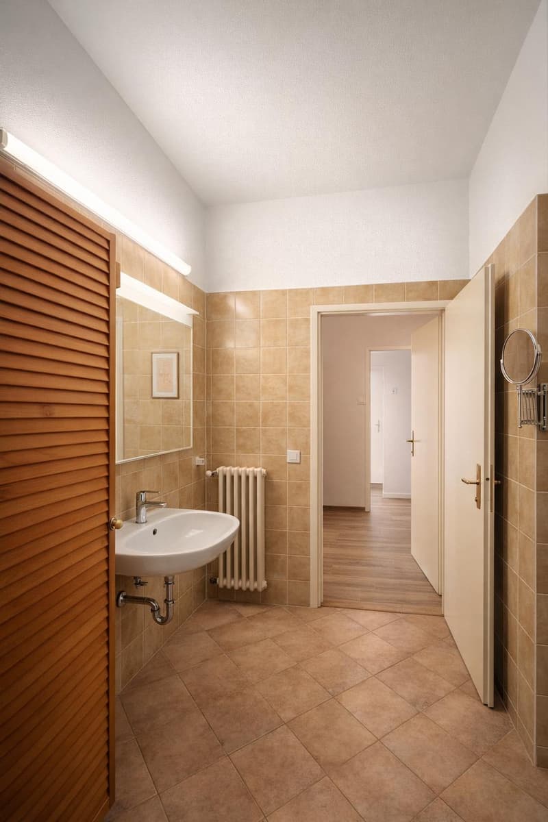 Appartamento 3,5 ristrutturato con balcone e cucina abitabile (14)