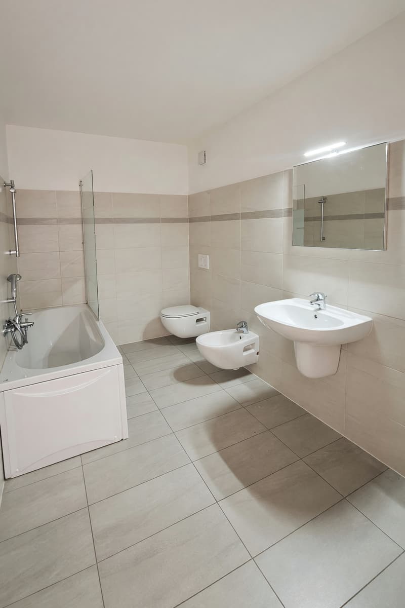 Casa contigua 5,5 locali con terrazza vista lago e giardino a Lopagno (18)