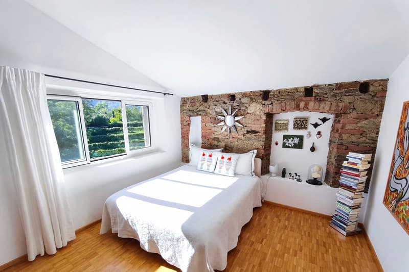 Casa bifamiliare 7 locali ristrutturata con giardino a Davesco (15)