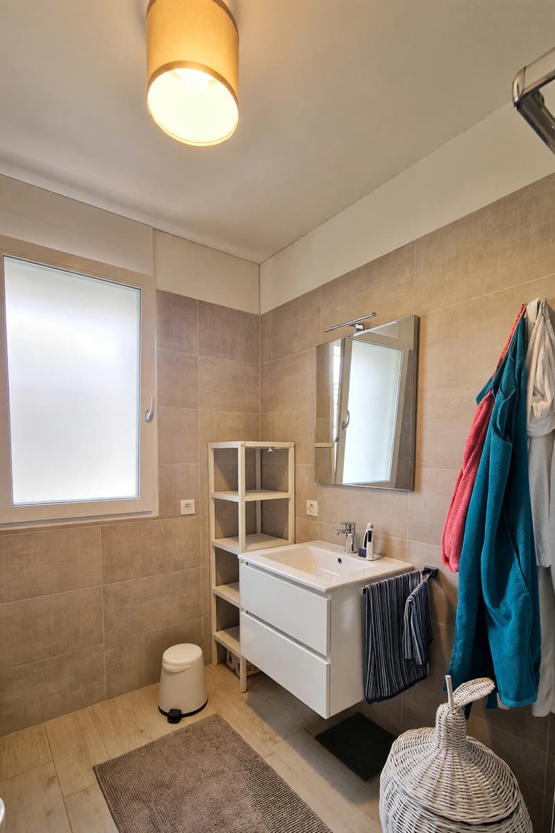 Moderno 2,5 con terrazza coperta e ottime possibilità di reddito (14)