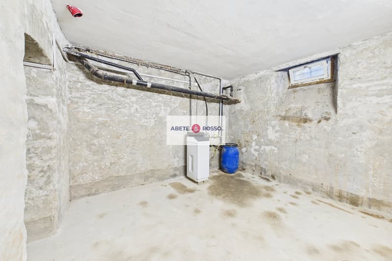 Casa unifamiliare contigua con giardino a Ligornetto (comune di Mendrisio). (24)