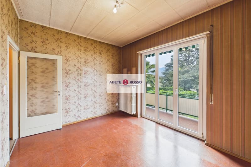 Casa con 2 appartamenti e giardino, in zona strategica, con prospettive di miglioramento (17)