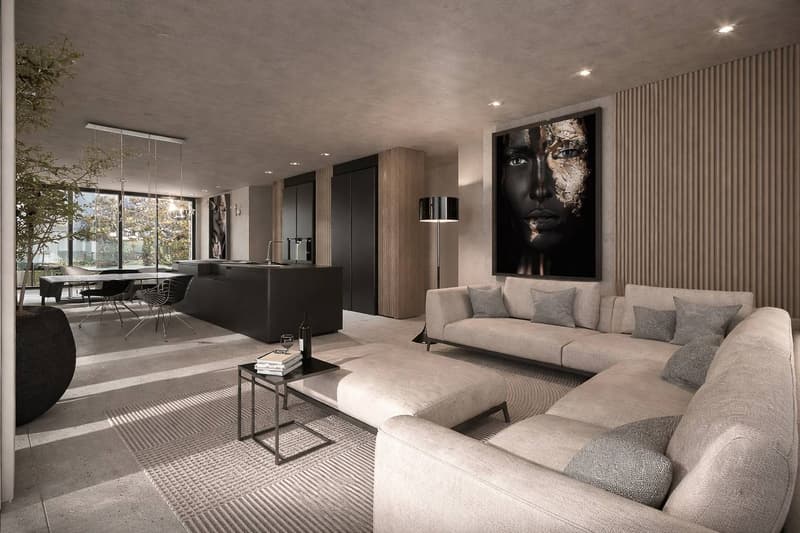 modern living room with large windows, gray sofa, coffee table, floor lamp, large painting, kitchen island, dining table, potted plant