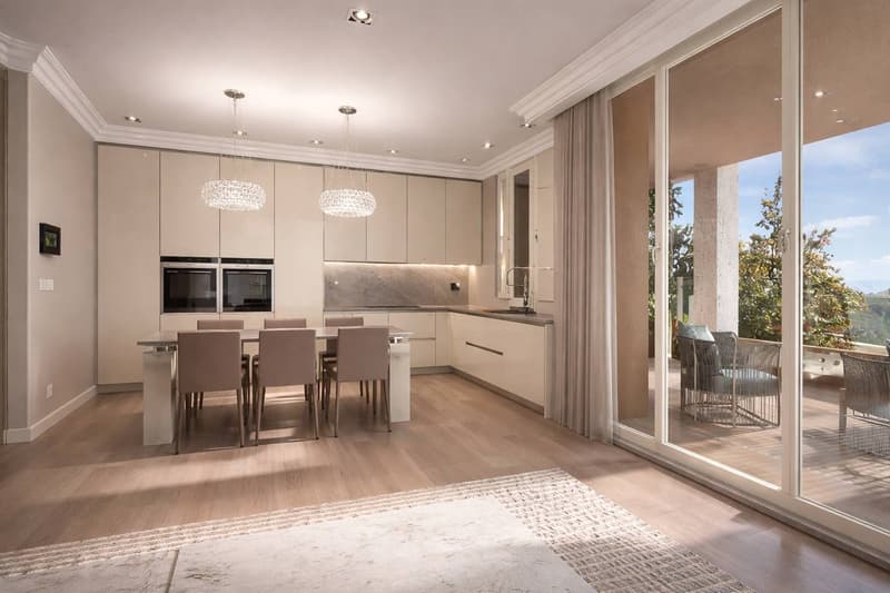 modern kitchen with dining area, large windows, balcony, wooden floor, chandeliers, white cabinets, modern appliances