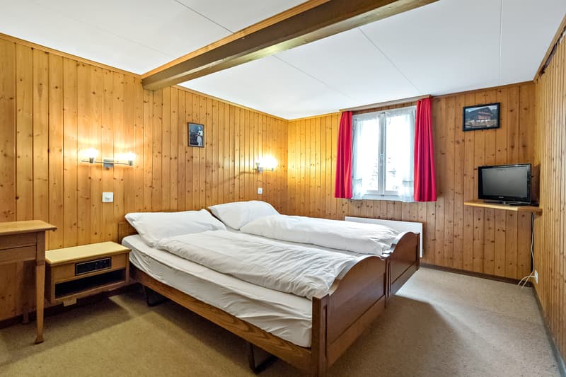 Zimmer mit Bettwäsche