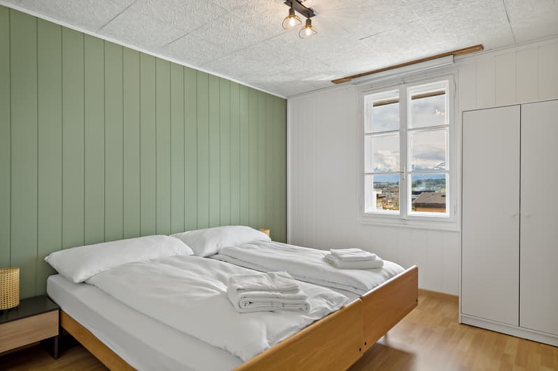 Schlafzimmer für eine Person mit Kleiderschrank